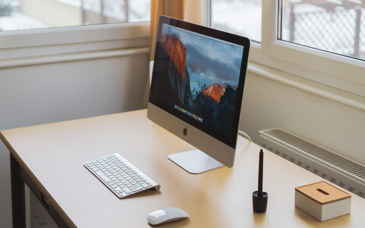 File photograph of a desktop computer in a home workspace, illustrating online account monitoring.