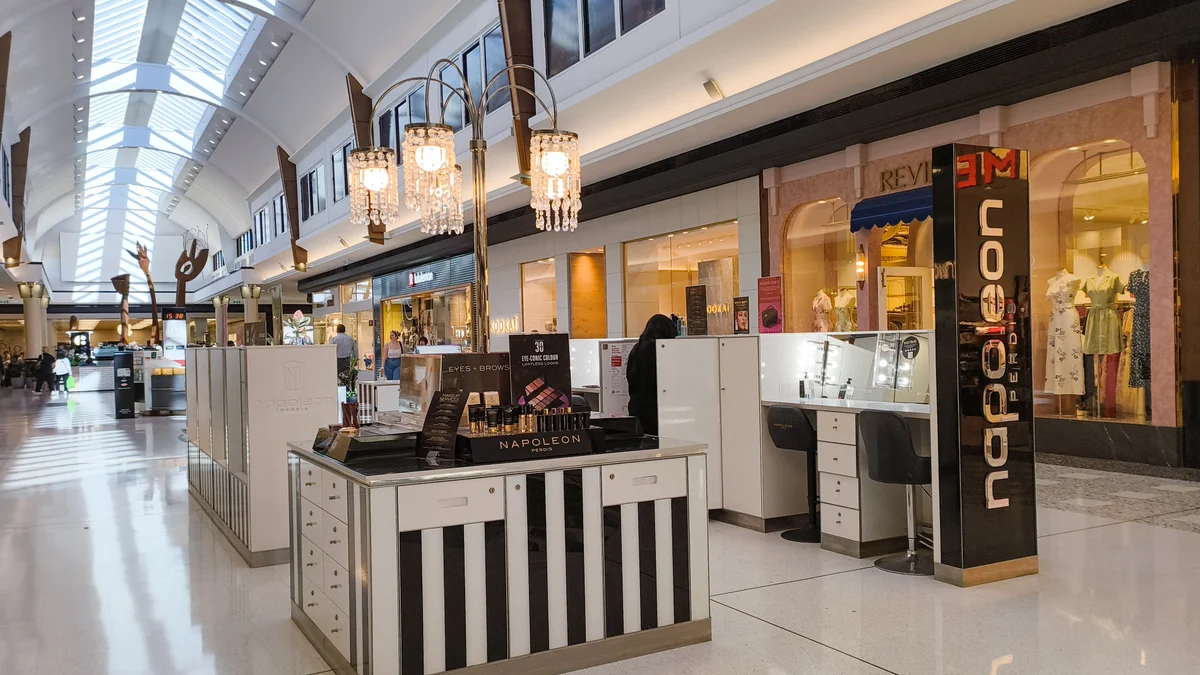 Napoleon Perdis cosmetics kiosk at Westfield Booragoon, photographed in 2024, not the affected Retail Express system.